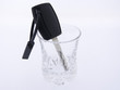  auto key in a glass