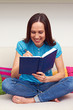 woman writing something in the daybook