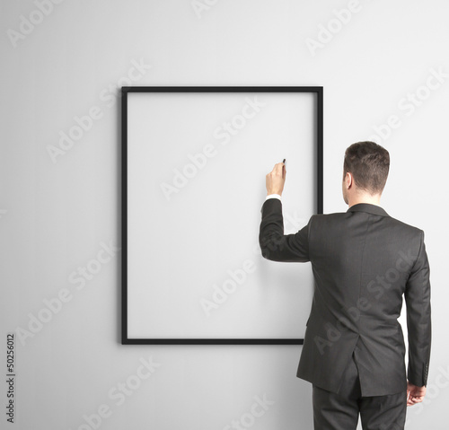 Photo: businessman drawing businessman drawing