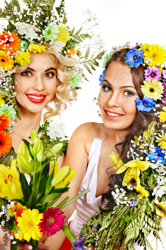 Photo: Woman with make up and flower. Woman with make up and flower.