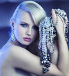 Fabulous woman with bouquet of jewelary
