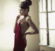 Elegant brunette woman with bun haircut