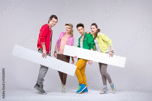 Photo: Group of teenagers in loose pose Group of teenagers in loose pose