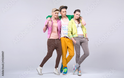 Photo: Lucky handsome young man with two attractive girls Lucky handsome young man with two attractive girls