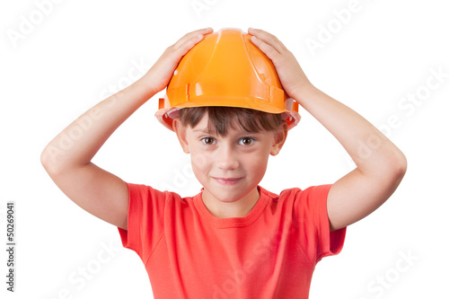 Photo: Little girl in the protective helmet Little girl in the protective helmet