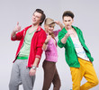 Three friends in optimistic pose