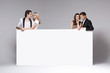 Two couples of friends relaxing together