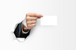 hand holding visiting card