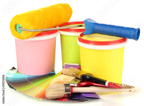 Photo: Set for painting: paint pots, brushes, paint-roller, palette of Set for painting: paint pots, brushes, paint-roller, palette of