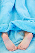 Child feet covered with sand Child feet covered with sand