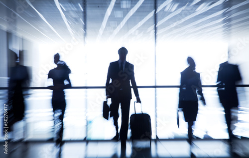 Photo: silhouettes of businesspeople silhouettes of businesspeople