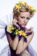 Blond beautiful woman with flowers