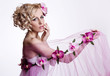 Blond beautiful woman with flowers