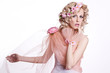 Blond beautiful woman with flowers