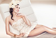 Sexy brunette lady with flower hat