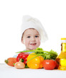 The little boy in a hat of the cook