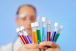 Photo: Medical multicolor test tubes with fluid sample in doctor hands Medical multicolor test tubes with fluid sample in doctor hands