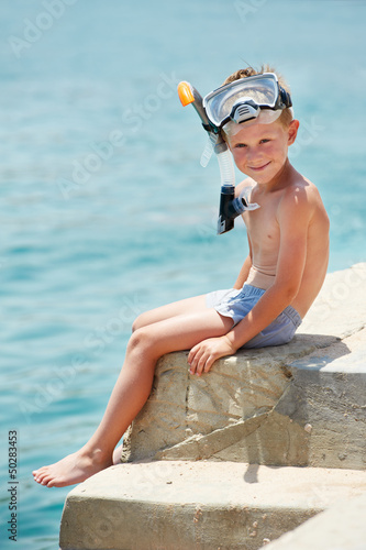 Photo: smiling boy with snorkeling gear smiling boy with snorkeling gear