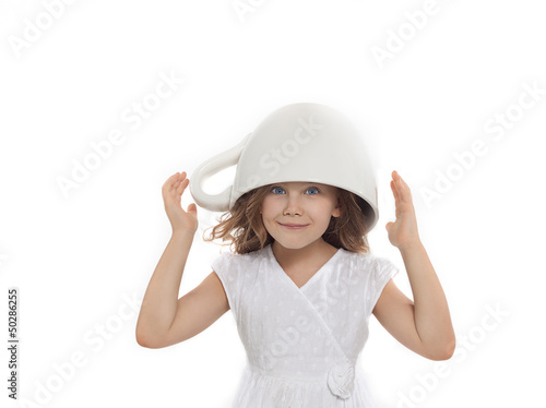 Photo: girl with big cup on her head girl with big cup on her head