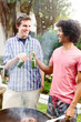 Guys at Independence day barbeque with beers