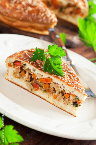 Photo: Slice of pie with chicken and vegetables , selective focus Slice of pie with chicken and vegetables , selective focus