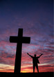 Silhouette of a man at the cross