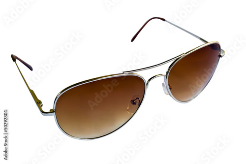 Photo: Brown sunglasses isolated on white Brown sunglasses isolated on white