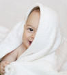 Baby under towel