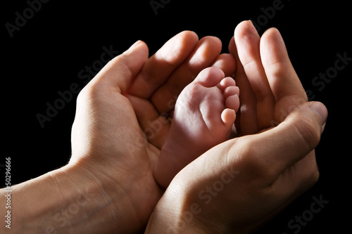 Photo: Hands Holding Baby Foot Hands Holding Baby Foot