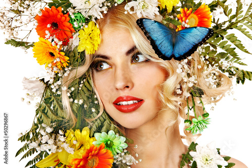 Photo: Woman with butterfly and flower. Woman with butterfly and flower.