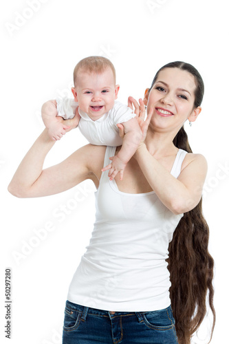 Photo: Mother playing with her baby on white background Mother playing with her baby on white background