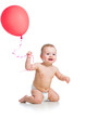 Smiling baby boy  with red  ballon in his hand isolated on white
