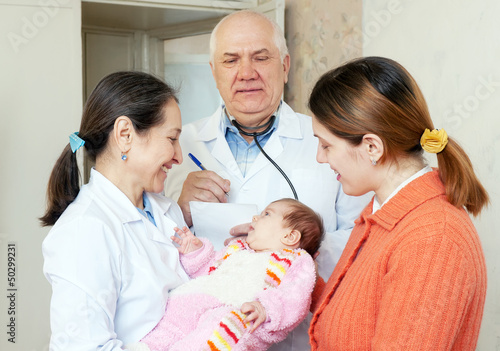 Photo: doctors give the healthy baby to mother doctors give the healthy baby to mother