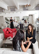 Woman Having Manicure At Parlor