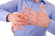 Young man taking off his golden wedding ring.