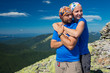 Portrait of couple at the top of the mountain