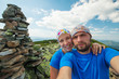 Portrait of couple at the top of the mountain