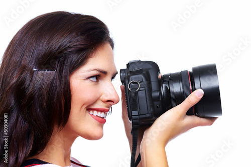 Photo: Woman with a photo camera. Woman with a photo camera.