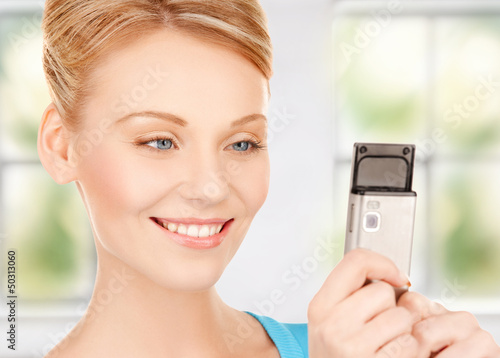 Photo: woman with cell phone woman with cell phone