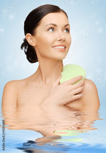 Photo: woman with sponge woman with sponge