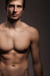 Handsome young man with naked torso