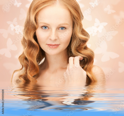 Photo: beautiful woman with butterflies in water beautiful woman with butterflies in water