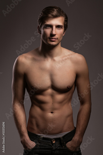 Photo: Handsome young man with naked torso Handsome young man with naked torso