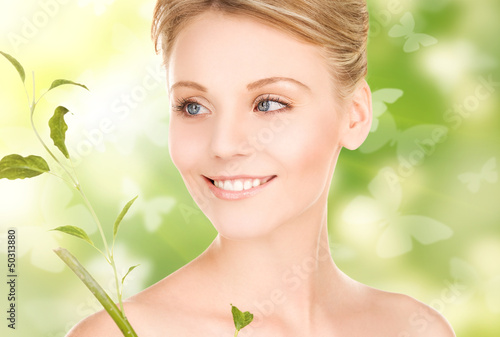Photo: woman with sprout and butterflies woman with sprout and butterflies