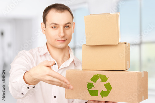 Photo: businessman with parcels businessman with parcels