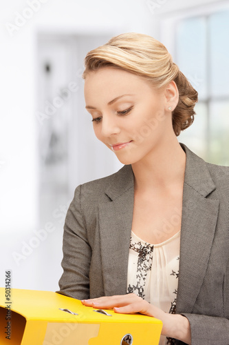 Photo: woman with folders woman with folders