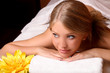 Photo: Portrait of young beautiful woman in spa environment Portrait of young beautiful woman in spa environment