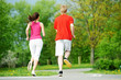 Photo: Young man and woman jogging outdoors Young man and woman jogging outdoors