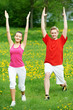 Photo: Young man and woman doing stretching exercises Young man and woman doing stretching exercises