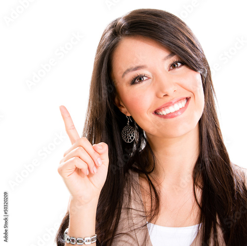 Photo: Woman pointing up Woman pointing up